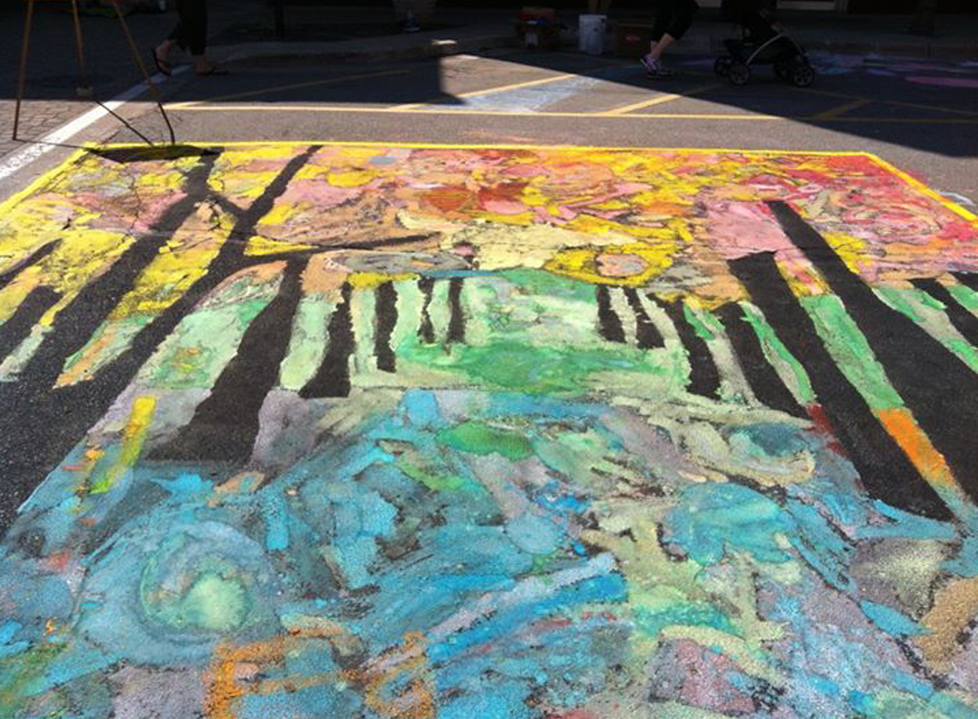 Collaborative mural for children created with chalk and tempera paint